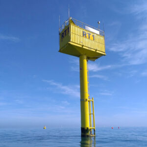 "Blue Accelerator" is a test facility designed for testing offshore wind technologies above, on, and under water. Inn2POWER's platform Testfacilities.eu helps innovators find the right test facility for their technology in a few clicks. A bright yellow offshore wind technology testing device in a blue sea.
