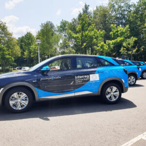 HyTrEc2: a line of Fuel Cell cars that the Provincie Drenthe now use as pool vehicles. We need sustainable transport and hydrogen vehicles are a great solution. HyTrEc2 explores what the market currently has (including these Hyundai Nexos) and rigorously tests their performance. The 8 project partners from 5 countries are adopting this new technology. The use of these vehicles as pool cars promotes hydrogen transport to staff members, individuals they meet & to the community, who see the cars and are curious. Line of Fuel Cell cars at the Province of Drenthe in the Netherlands.