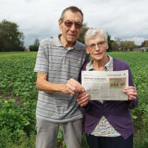 PARTRIDGE: Proud project partner's grandparents holding up article in Church magazine. Our Flemish project partner Yasmine Verzelen’s grand parents receive the local Church magazine through their post. When they found an article in a recent issue, explaining the PARTRIDGE project based on an interview with their granddaughter, they sent us this photo. Photo: Elsy_Colpaert Two elderly people in green field holding a newspaper.